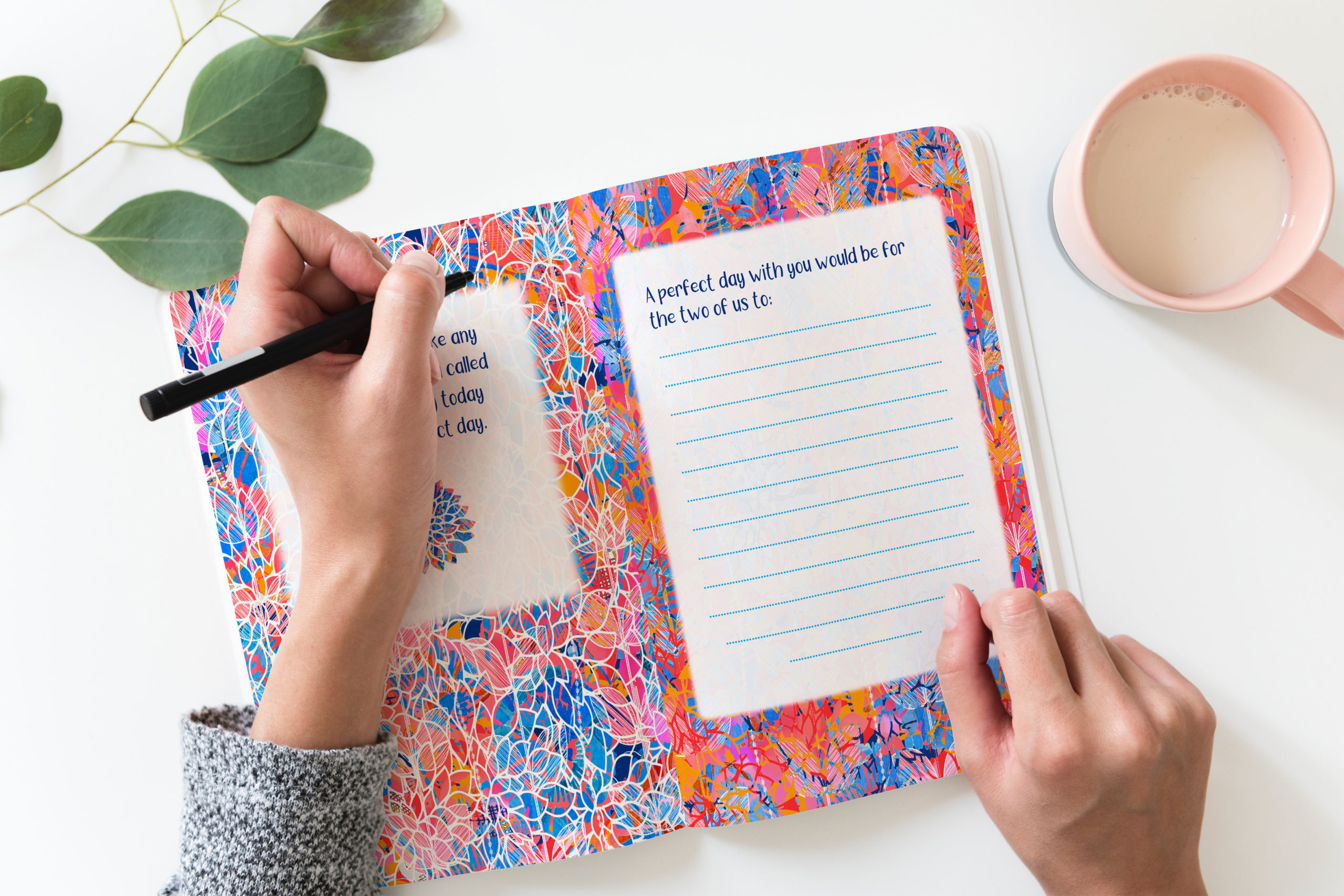 This image shows a person writing in a Gift Journal